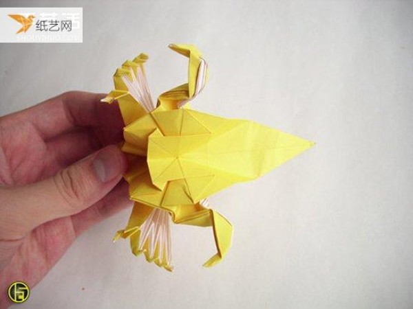 A tutorial on the more complex origami werewolf folding process with step-by-step instructions