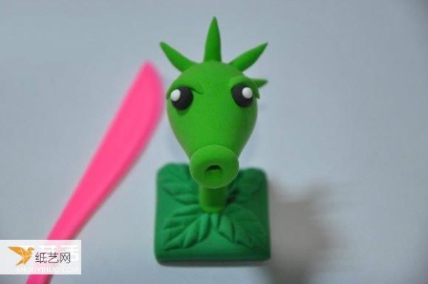 Detailed illustration of handcrafting Plants vs. Zombies Peashooter using ultra-light clay