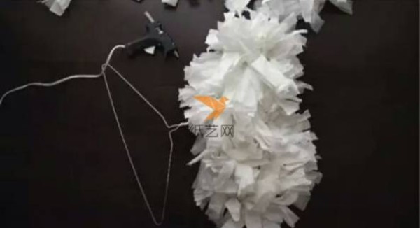 Turn waste into treasure. How to make angel wings made from clothes hangers and paper towels.