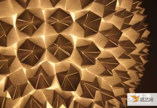 A beautiful origami chandelier lampshade made from hundreds of southeast and northwestern pieces