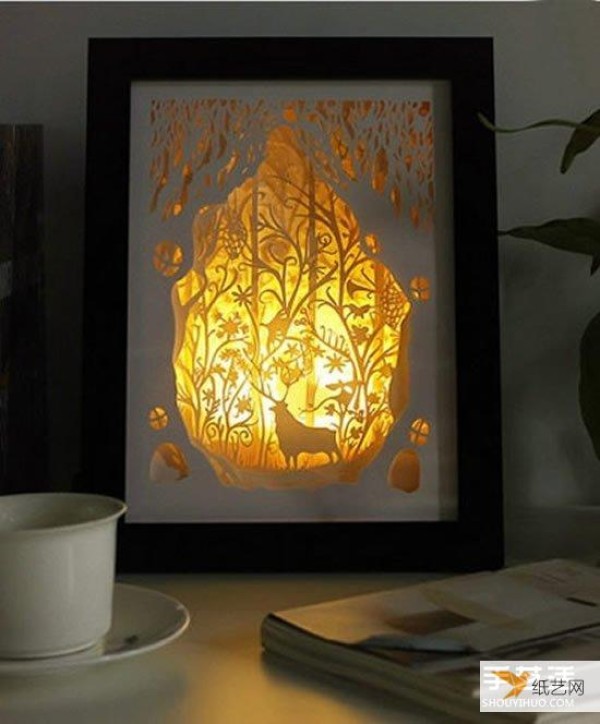 Particularly exquisite pictures of paper-carved night lights seem to hide a magical fairy tale kingdom