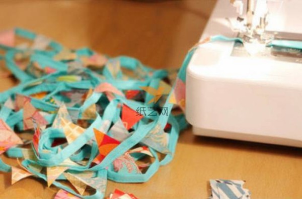 Fabric tutorial for wrapping decorative ribbons with floral pennants