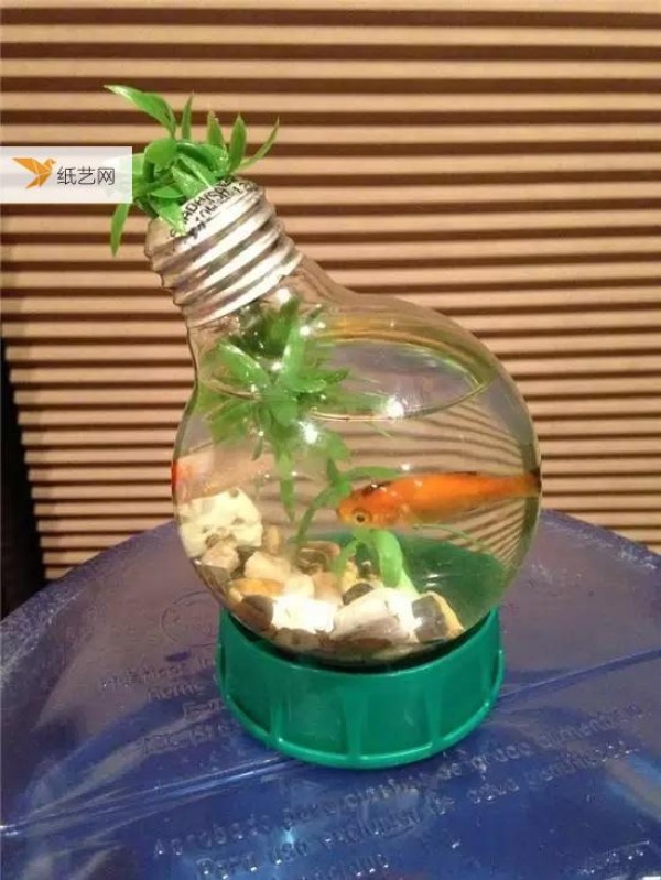 Old light bulbs can also be made into crystal clear vases, fish tanks, and little snowmen! Tutorial on turning waste into treasure