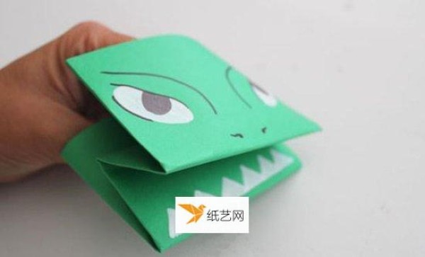 Little monster hand puppet toy made from origami