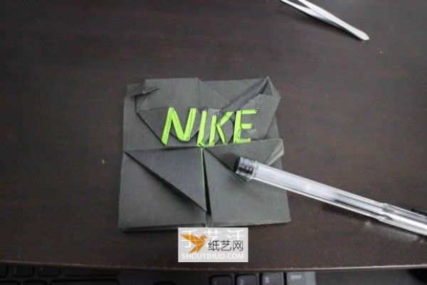 How to fold the Nike logo using origami