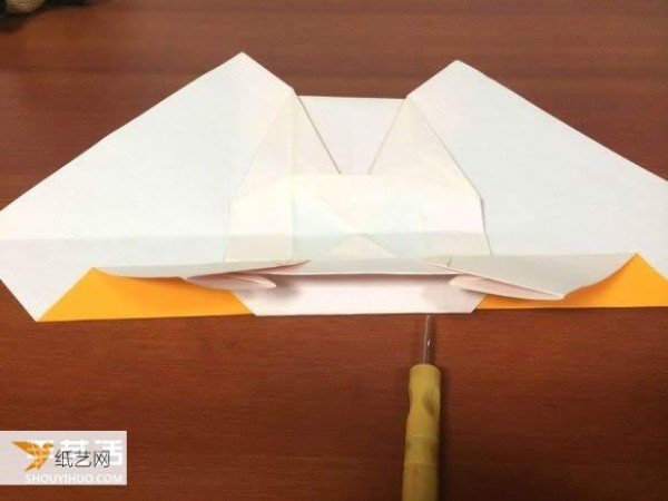 Illustrated tutorial that comprehensively demonstrates the method of hand-folding a paper sports car