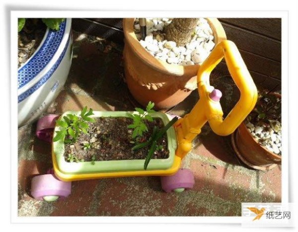 A beautiful miniature garden bonsai made from an old toaster