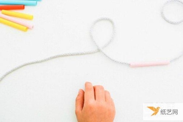 Use toddler straws to craft beautiful colorful holiday decorations