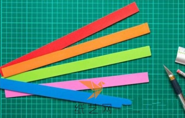 Tutorial on using toilet paper tube waste to make a rainbow telescope toy