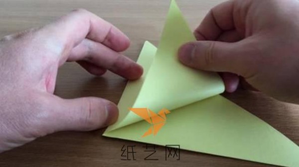 A step-by-step tutorial on how to make an origami peace dove