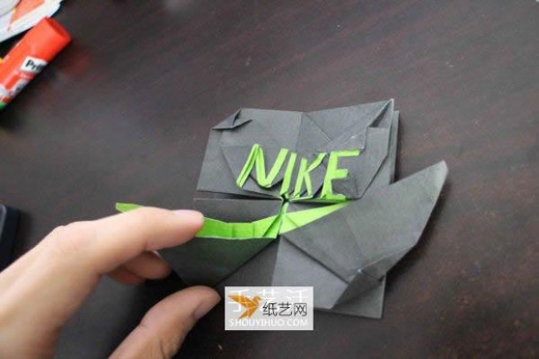 How to fold the Nike logo using origami