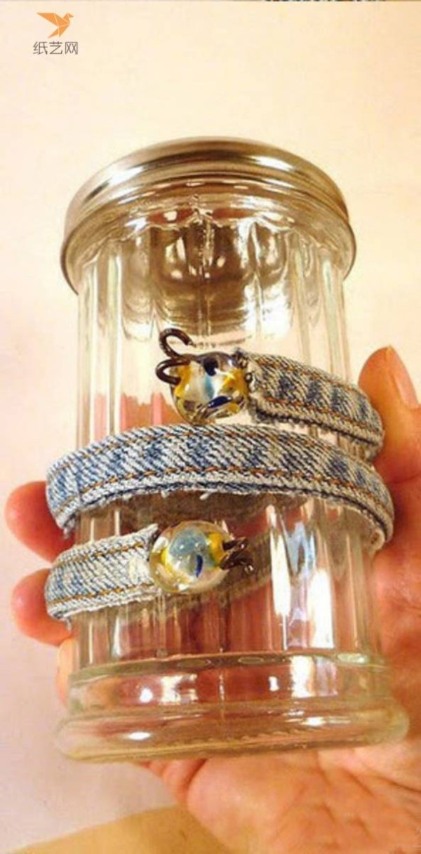 Tutorial on turning waste into treasure. DIY tutorial on how to make a personalized three-ring bracelet using unworn jeans.