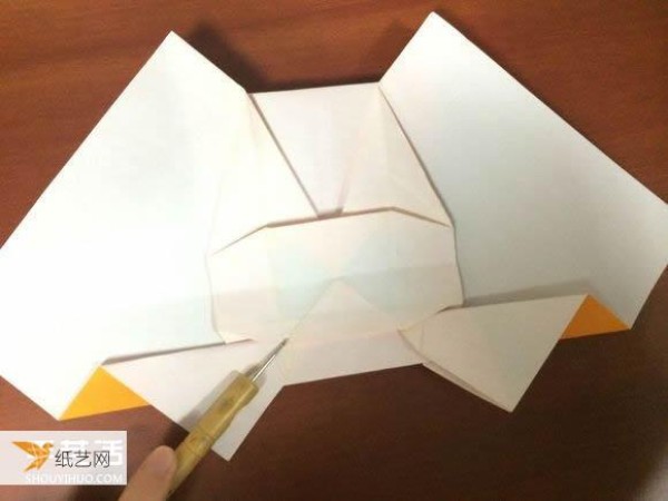 Illustrated tutorial that comprehensively demonstrates the method of hand-folding a paper sports car