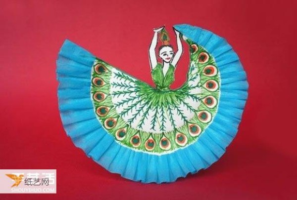 Handmade beautiful childrens paper plate drawing depicting a girl dancing the peacock dance