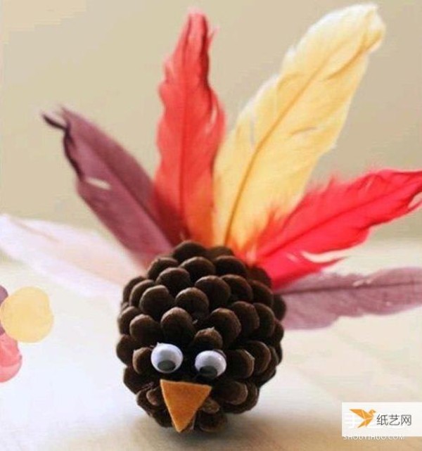 Simple and cute pine cone small handmade bird creation for children