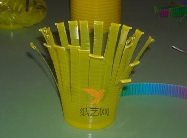 Childrens handicraft: using plastic cup waste to make a cute little basket