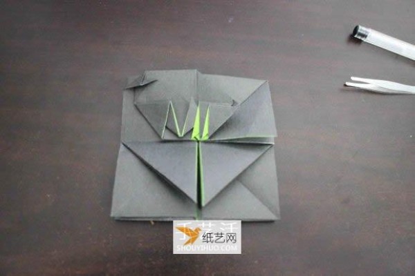 How to fold the Nike logo using origami