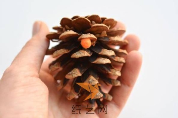 Girly Christmas tree decorations made by turning waste into treasures from pine cones