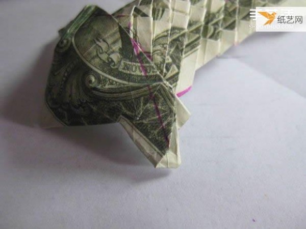 How to fold paper carp using dollars