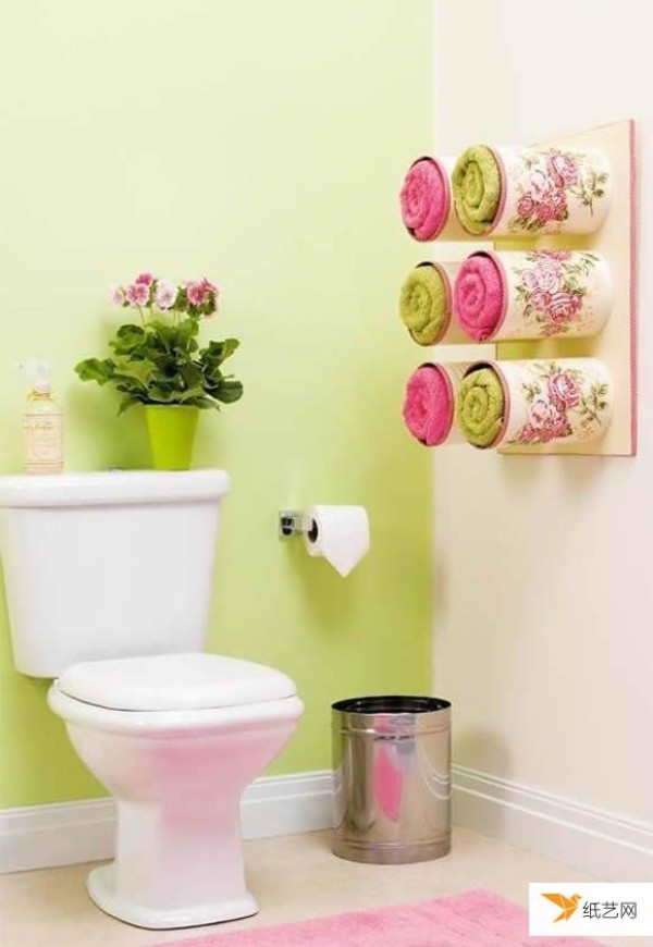 Use waste milk powder cans to create a stylish and stylish bath towel storage rack