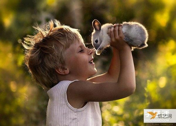 Appreciate the warm photography of a very cute little boy and animals