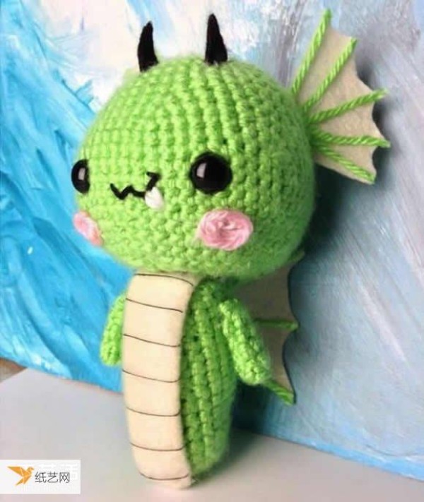 A very cute and unique knitted dragon made with crochet