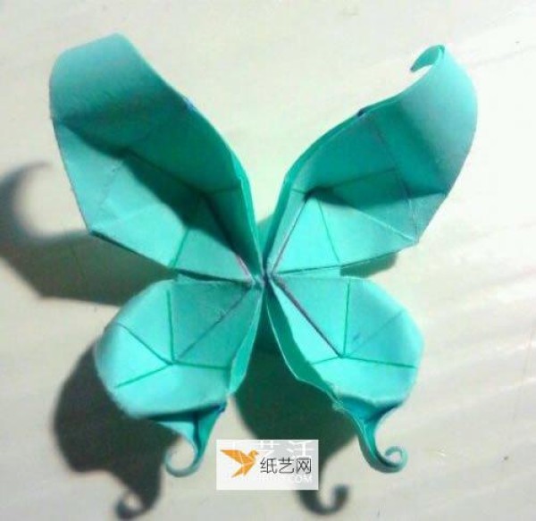 Illustrated tutorial for hand folding origami swallowtail butterfly