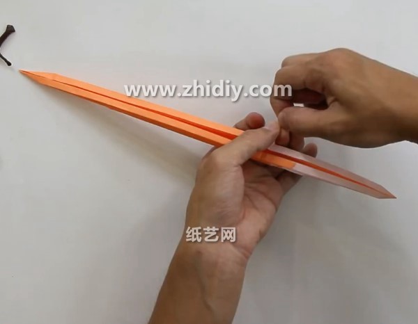 Video tutorial on how to fold a simulated origami sword