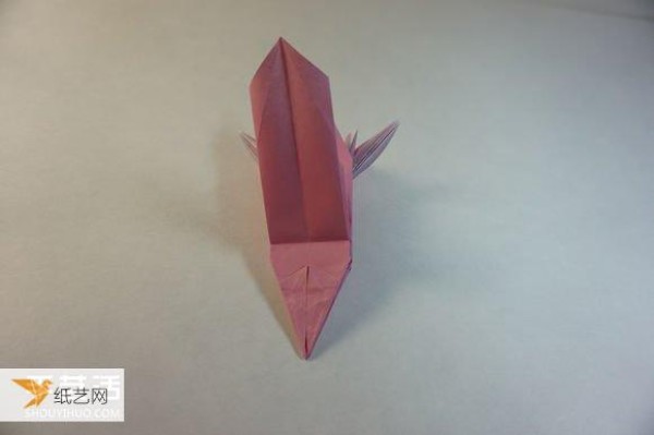 Illustrated step-by-step tutorial for girls using origami to fold something that looks complicated