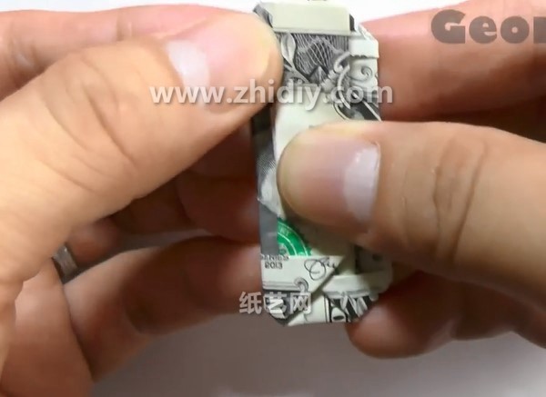 How to fold a dollar origami ring by hand