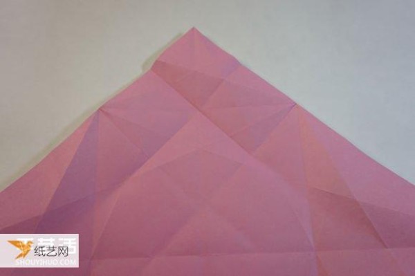 Illustrated step-by-step tutorial for girls using origami to fold something that looks complicated