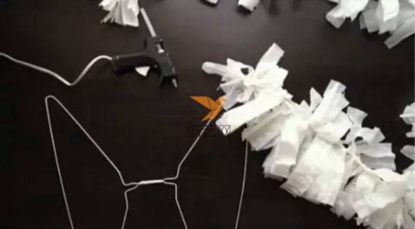 Turn waste into treasure. How to make angel wings made from clothes hangers and paper towels.