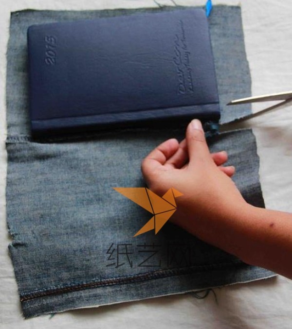 DIY tutorial on using old jeans to make textured book covers