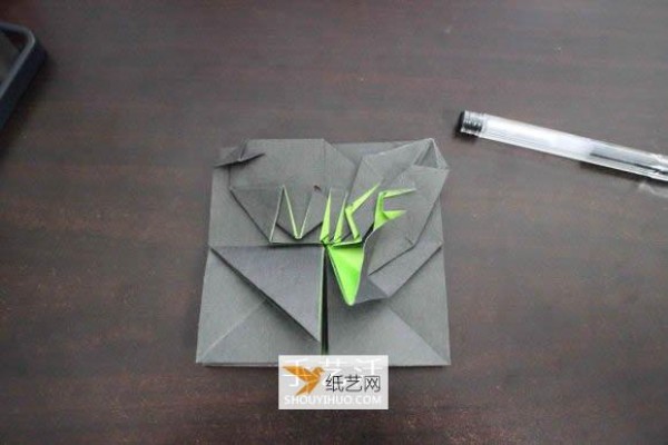 How to fold the Nike logo using origami