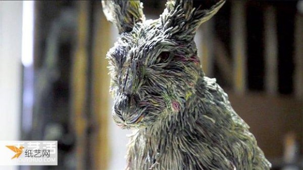 Animal sculptures that scratch the ends of the souls hair and are rubbed with newspaper