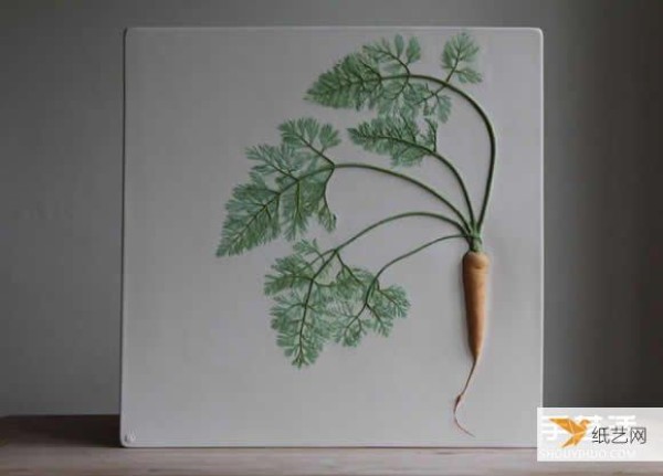 Add flowers, plants and vegetables to clay to create beautiful plant fossil tiles