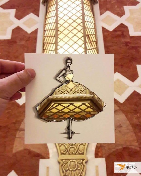 A very unique and creative paper-cut painting that puts the world into a dress!