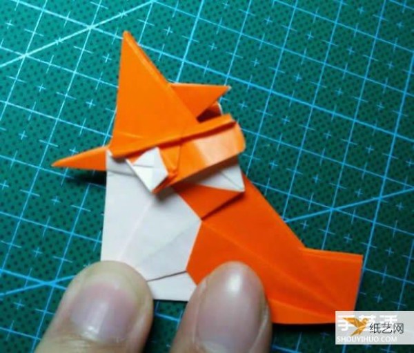 Detailed explanation of the manual method of folding a paper kingfisher tutorial.