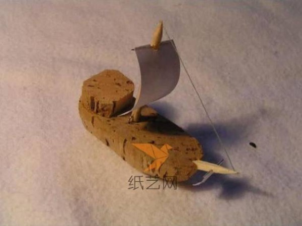 DIY tutorial for using waste incandescent light bulbs to make a boat inside a light bulb