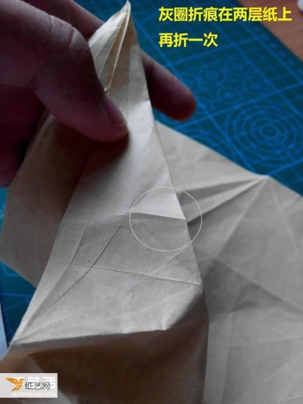 Detailed step-by-step illustration of using origami to fold a complex three-dimensional rabbit head