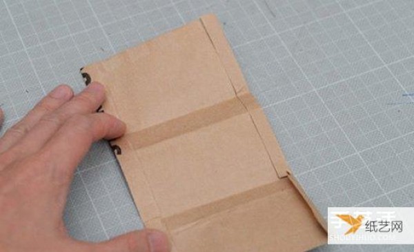 Illustrated tutorial on how to make a personalized wallet using unused Starbucks paper bags