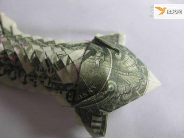 How to fold paper carp using dollars