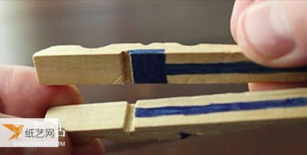 Use wooden clips to make your own personalized toy gun