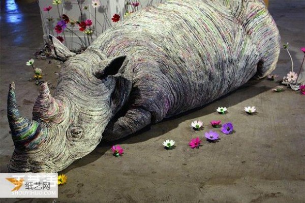 Animal sculptures that scratch the ends of the souls hair and are rubbed with newspaper