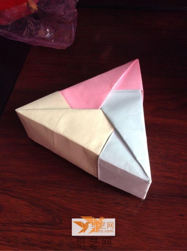 Origami triangle gift box