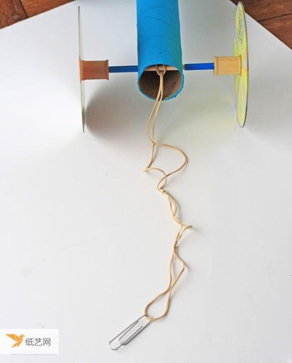 Simple and beautiful step-by-step illustration of the homemade rubber band powered car