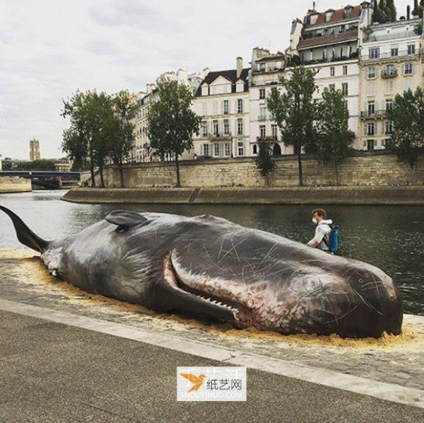 Stunning installation art! Sperm whale stranded on the banks of the Seine