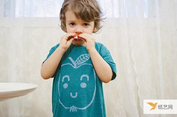 Mom gives her son a hand-drawn personalized T-shirt as a loving gift