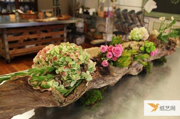 Illustrated method of using dead wood from waste to make personalized flower pots and forest-style flower arrangements.