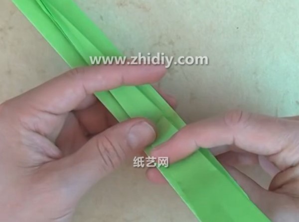 Tutorial on how to make a simple origami broom by hand